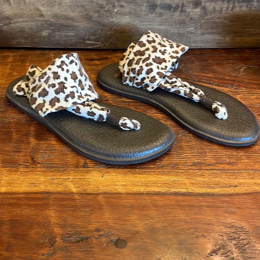 Animal print Sanuk yoga sandals.